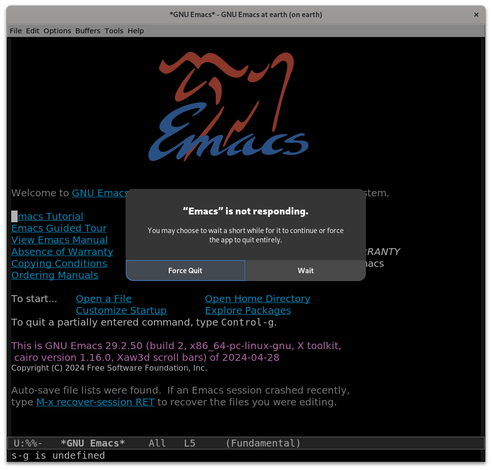 A screenshot of the Emacs splash page with a popup reading "Emacs is not responding. You may choose to wait a short while for it to continue or force the app to quit entirely."